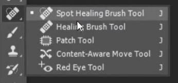 Healing Brush Tool or the Clone Stamp Tool