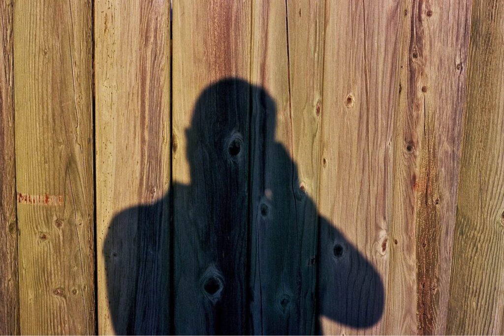 Shadow Self Portrait Self-portrait created using dramatic shadows for artistic effect.